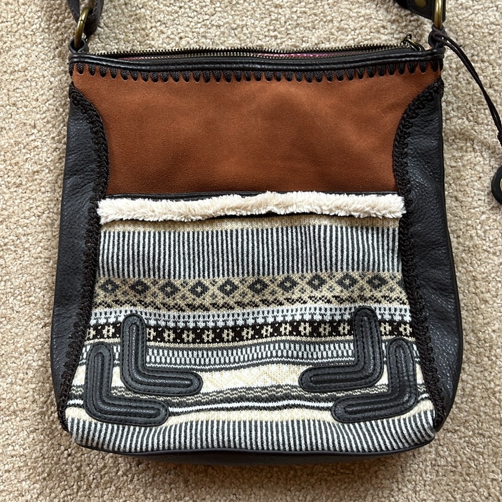 The Sak suede and leather purse with adorable tan accents and lots of pockets